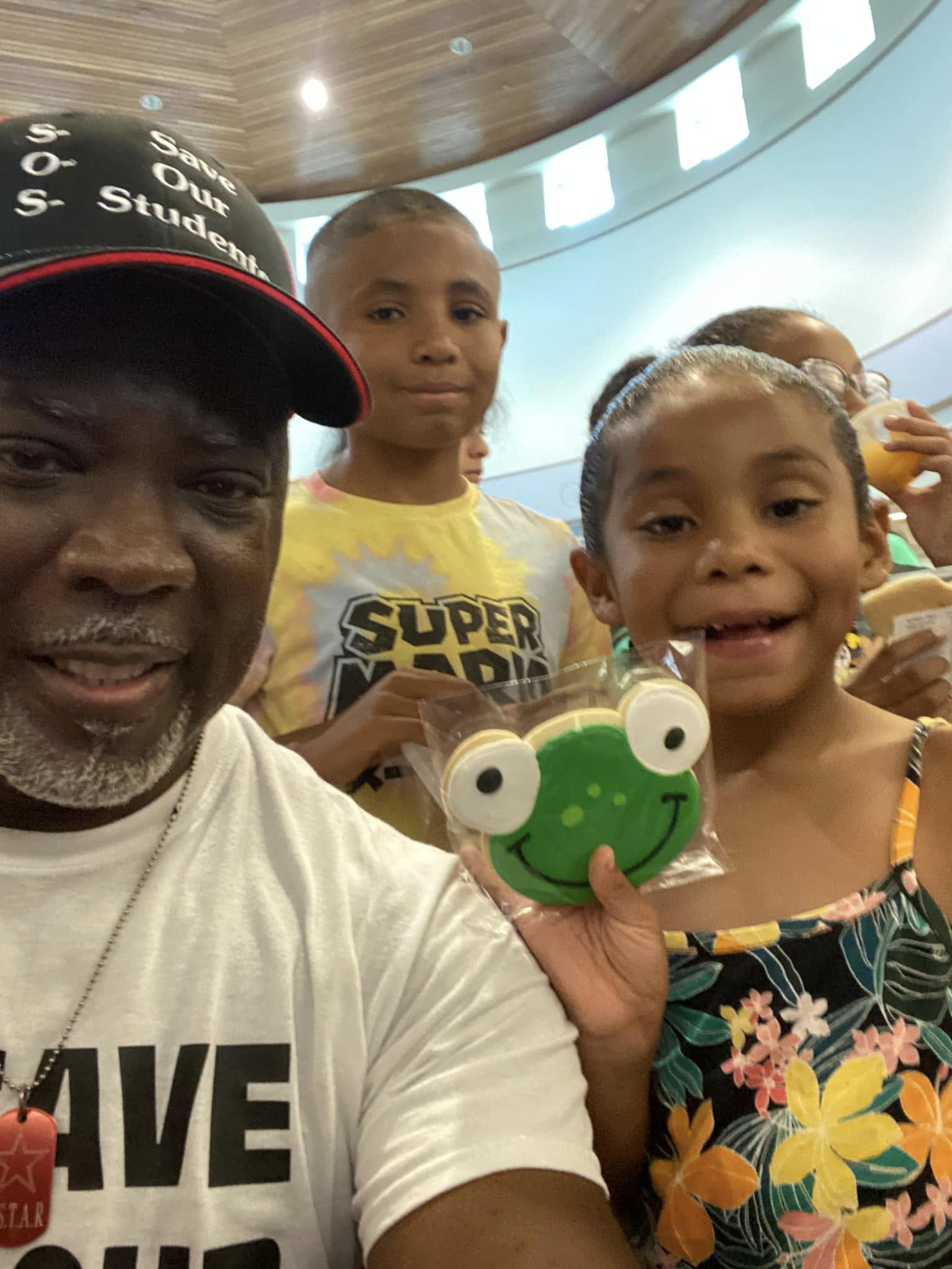Patrick Johnson with children at the August 2022 Uvalde library outreach.